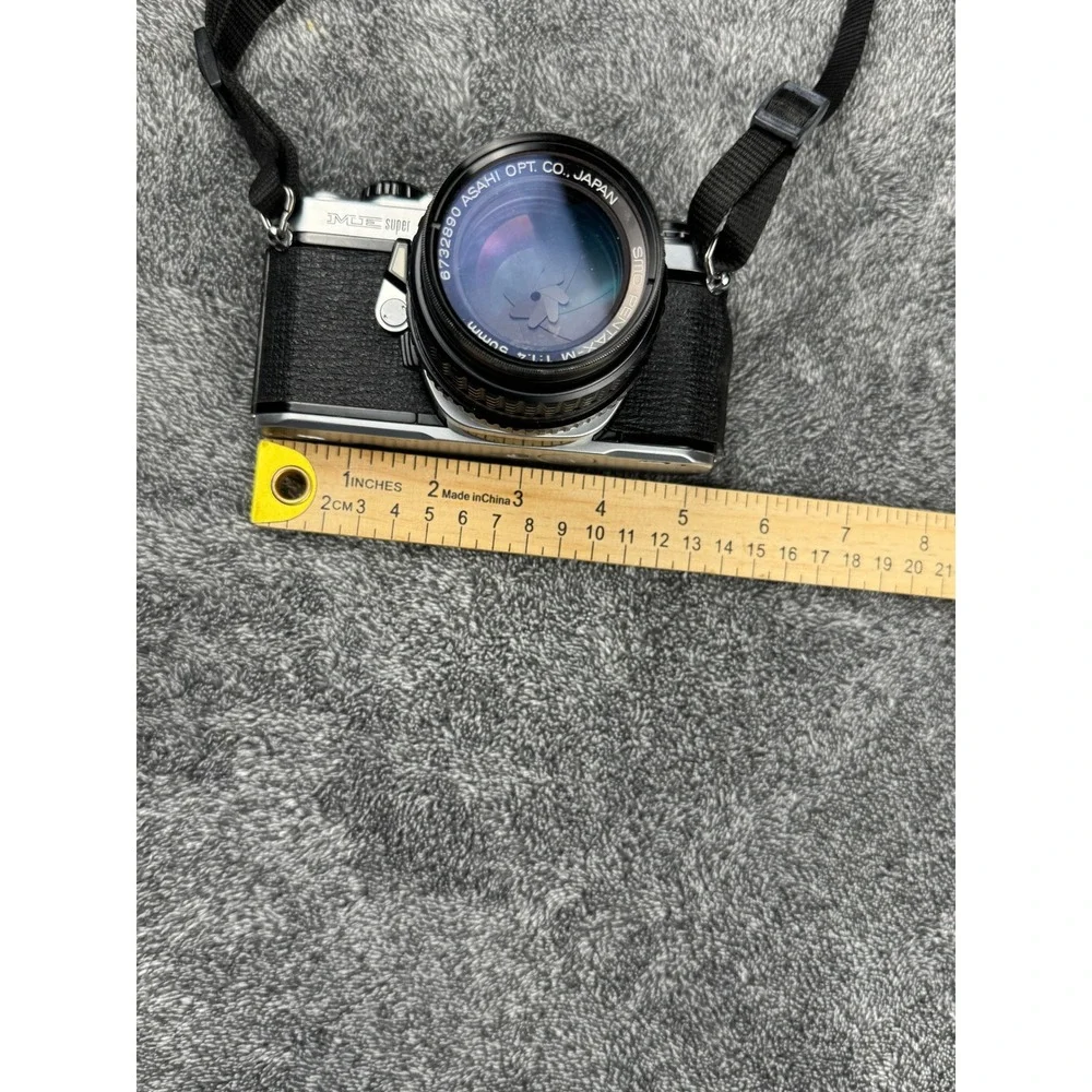 Pentax ME Super 35mm SLR Camera w 50mm Lens AF200T‎ Flash Vintage Kit
